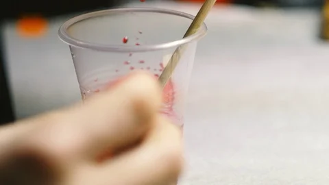 Mixing epoxy. Jewelry creating process. Stock Footage 119841046