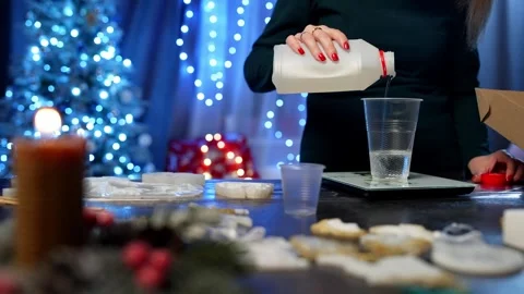 Mixing epoxy resin to create handmade Christmas tree toys. Stock Footage 259182320