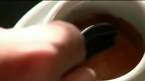 Mixing an espresso coffee 스톡 동영상 12325458