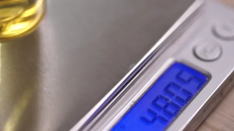 Mixing the essential oils in the laboratory. composition weighing Stock Footage 195610430