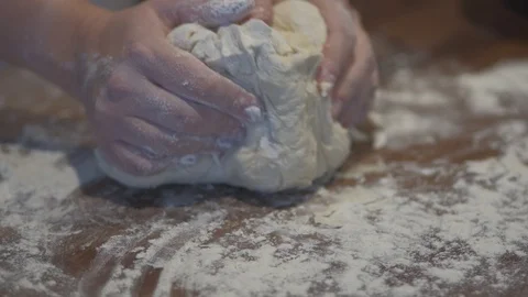 Mixing flour dough close up Stock Footage 127694939