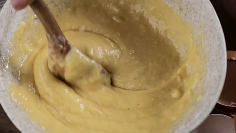 Mixing flour with eggs and sugar for making dough Stock Footage 101991722