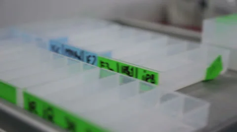 Mixing fluids in laboratory Stock Footage 34314849