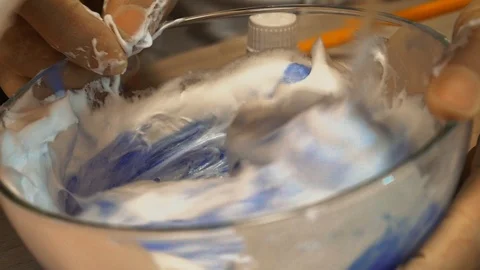 Mixing foam with dye Stock Footage 97657769