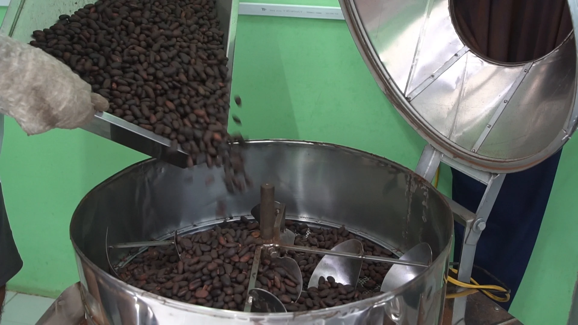 Mixing fresh roasted cocoa Stock Video Pond5