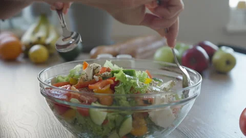 Mixing Fresh Vegetable Salad With Mozzarella In Bright Cozy Kitchen Scene 스톡 동영상 308454792