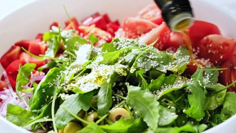 Mixing a fresh vegetables salad Stock Footage 265472532