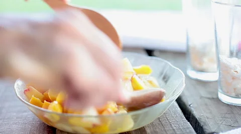 Mixing fruit salad Stock Footage 63292604