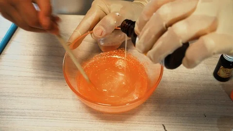 Mixing of glue with dye 스톡 동영상 97657879