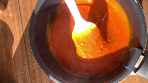 Mixing hot sauce in a pot Stock Footage 259454586