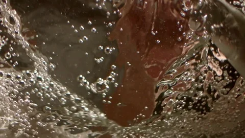 Mixing hot water / slow motion shot Stock Footage 74126786