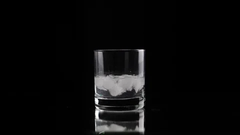 Mixing ice with cocktail straw Stock Footage 101489694