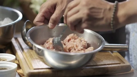 Mixing ingredients in a bowl Stock Footage 145354773
