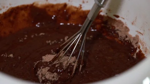 Mixing ingredients for chocolate cake Stock Footage 100635746