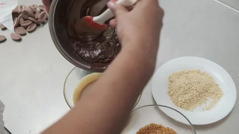 Mixing ingredients for chocolate sweets. Stock Footage 132787361