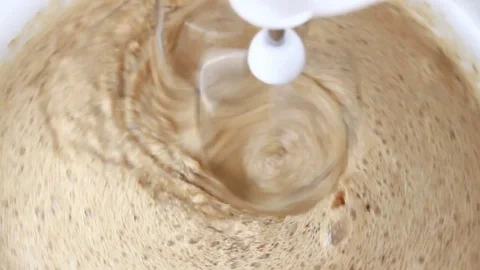 Mixing ingredients for coffee mousse Stock Footage 72408638