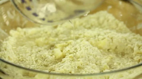 Mixing ingredients into the pie crust Stock Footage 43452962