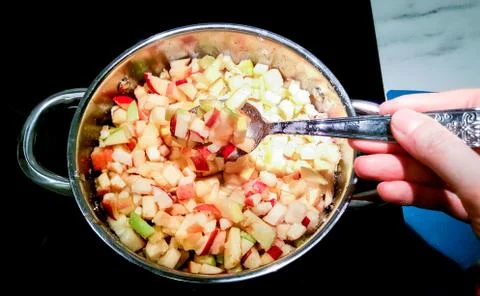Mixing jam with a spoon. Stock Photos