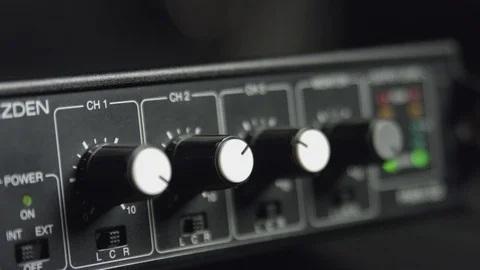 Mixing knobs on a portable sound mixer 動画素材 92767397
