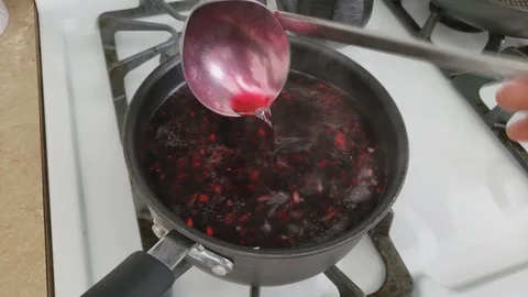 Mixing with ladle prepared basic Borscht or red beet soup Video stock 103191037