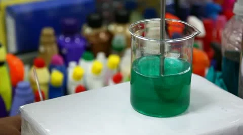 Mixing liquid in a beaker Stock Footage 24652508