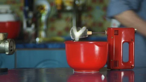 Mixing liquid dough for baking using an electric mixer. Stock Footage 128831188