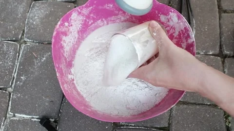 Mixing liquid with plaster. DIY creative process tutorial. 動画素材 316920617