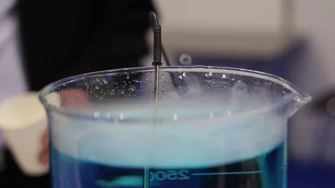 Mixing of the Liquid in the Tube 스톡 동영상 70402843