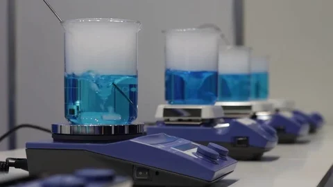 Mixing of the Liquid in the Tube Stock Footage 70403128
