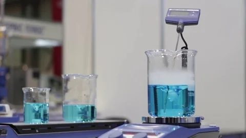 Mixing of the Liquid in the Tube Stock Footage 70403745