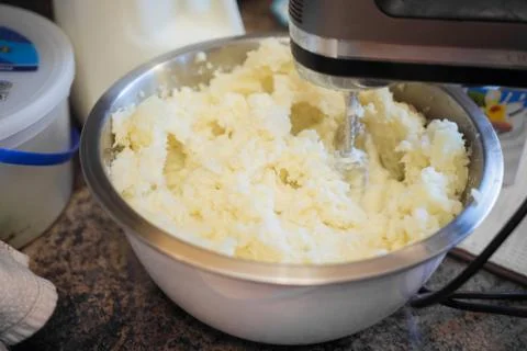 Mixing mashed potatoes for dinner Stock Photos