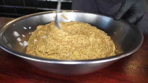 Mixing Matzo Ball Mixture in Stainless Steel Bowl, Close-Up, Slow Motion 스톡 동영상 332814588