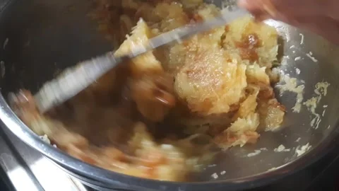 Mixing Melted Jaggery with Grated Raw Mango Together for Mango Preserve 스톡 동영상 335754220