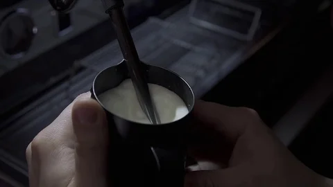 Mixing milk in slow motion Stock Footage 82732167