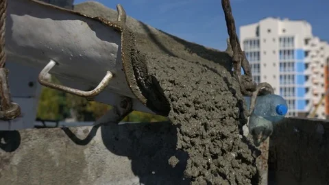 Mixing mortar for home construction Stock Footage 122096785