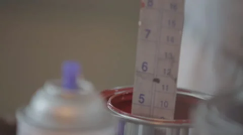 Mixing Paint in Can Stock Footage 44291885