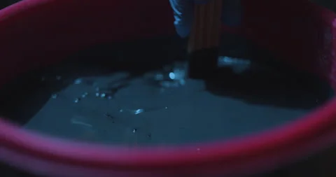 Mixing Paint Stock Footage 320357994
