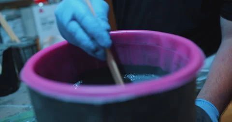 Mixing Paint Stock Footage 320358077