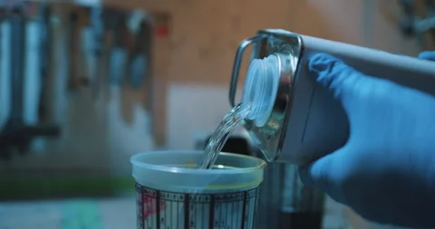 Mixing Paint Stock Footage 320358221