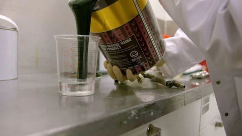 Mixing paint in a lab, wide Video stock 78426764
