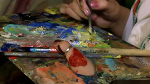 Mixing of the paint on the palette Stock Footage 61861545