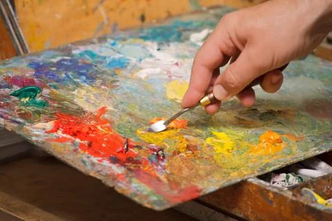 Mixing paints 库存照片