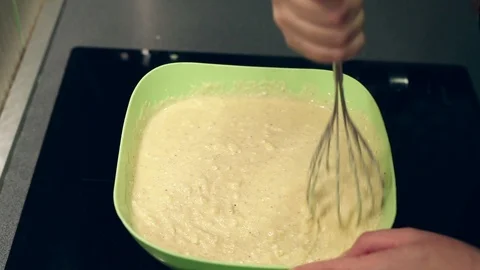 Mixing pastry for cornbread muffins 動画素材 127083959