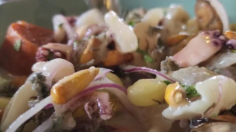 Mixing up Peruvian ceviche  Video stock 308815856