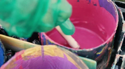 Mixing pink paint Stock Footage 67406309