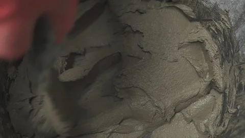 Mixing of a plaster solution by manual method . professional builder. closeup Video stock 88694997