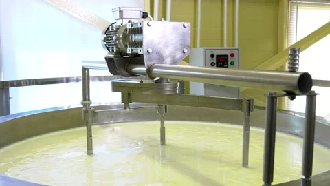 The mixing process in cheese production. Stock Footage 170956413