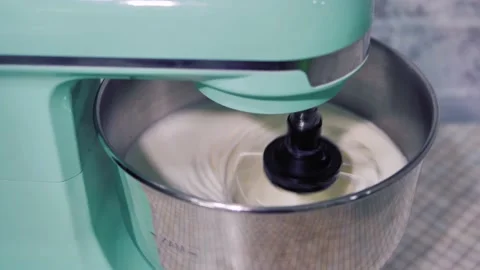 Mixing products with a planetary mixer Stock Footage 130754374