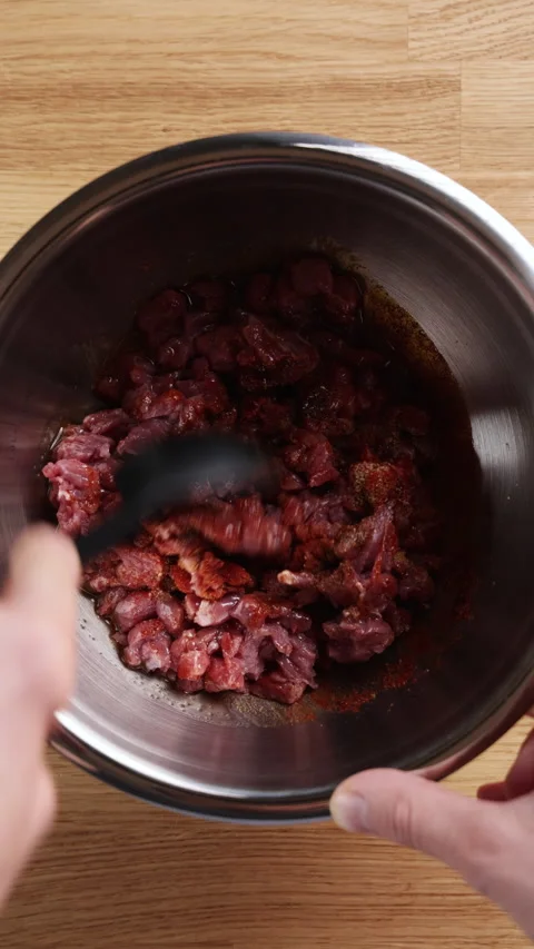 Mixing Raw Lamb With Spices Using Spoon Top View Stock-Footage 330341926