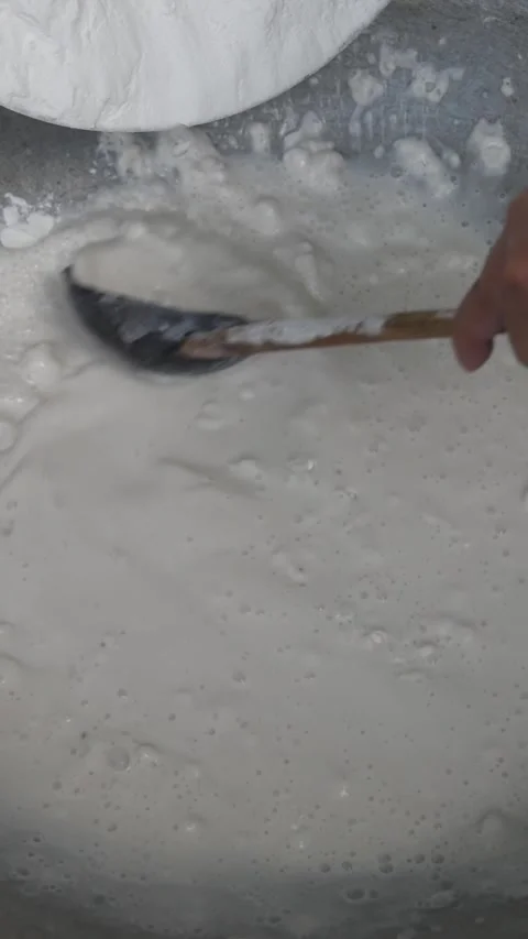 Mixing rice flour with water create smooth batter Stock Footage 301483728